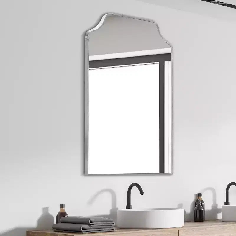 Miroir mural à cadre métallique et bord festonné