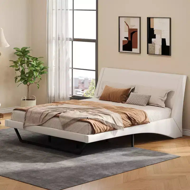 Lit plateforme moderne King Size, en cuir PU rembourré avec un design incurvé, pieds trapézoïdaux suspendus